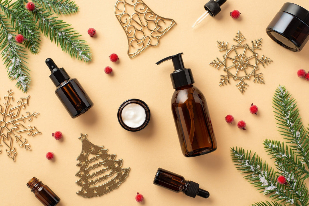 Flat lay of advanced skincare ingredients including peptides, botanical powders, and oils on a beige background with ornaments, berries and fir branches.