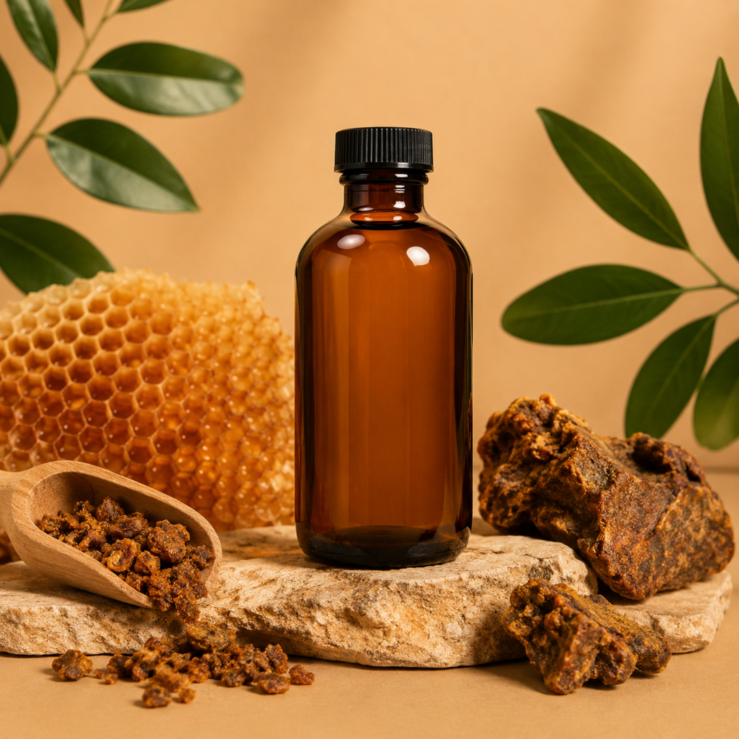 Brown glass bottle with honeycomb and honey on a beige background