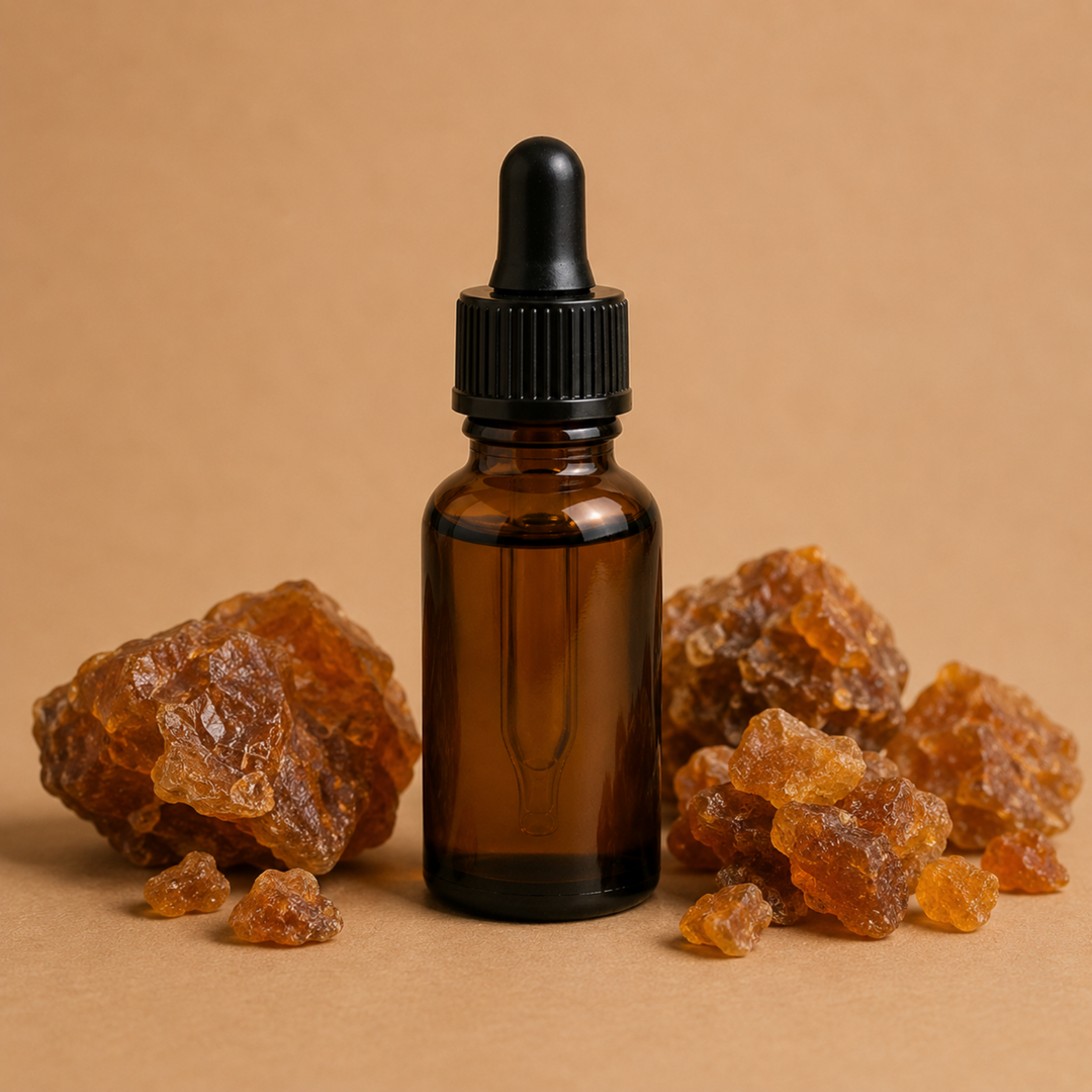 Brown glass dropper bottle with amber resin on a beige background