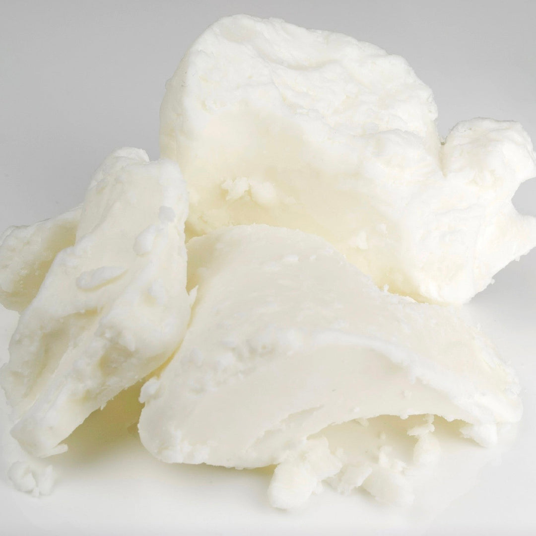 Close-up of deodorized cocoa butter on a light gray background