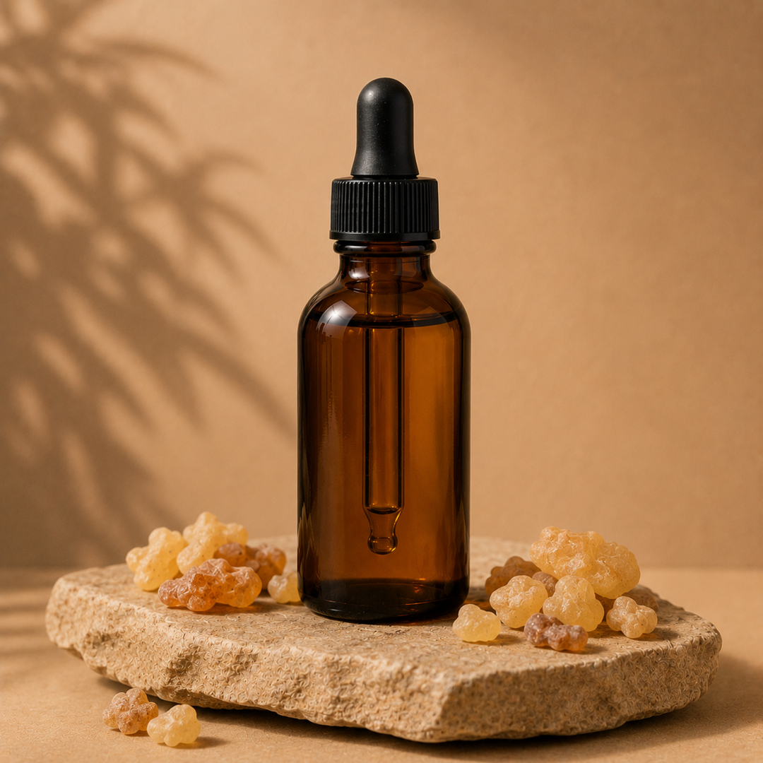 Amber bottle, on a rock with frankincense resin