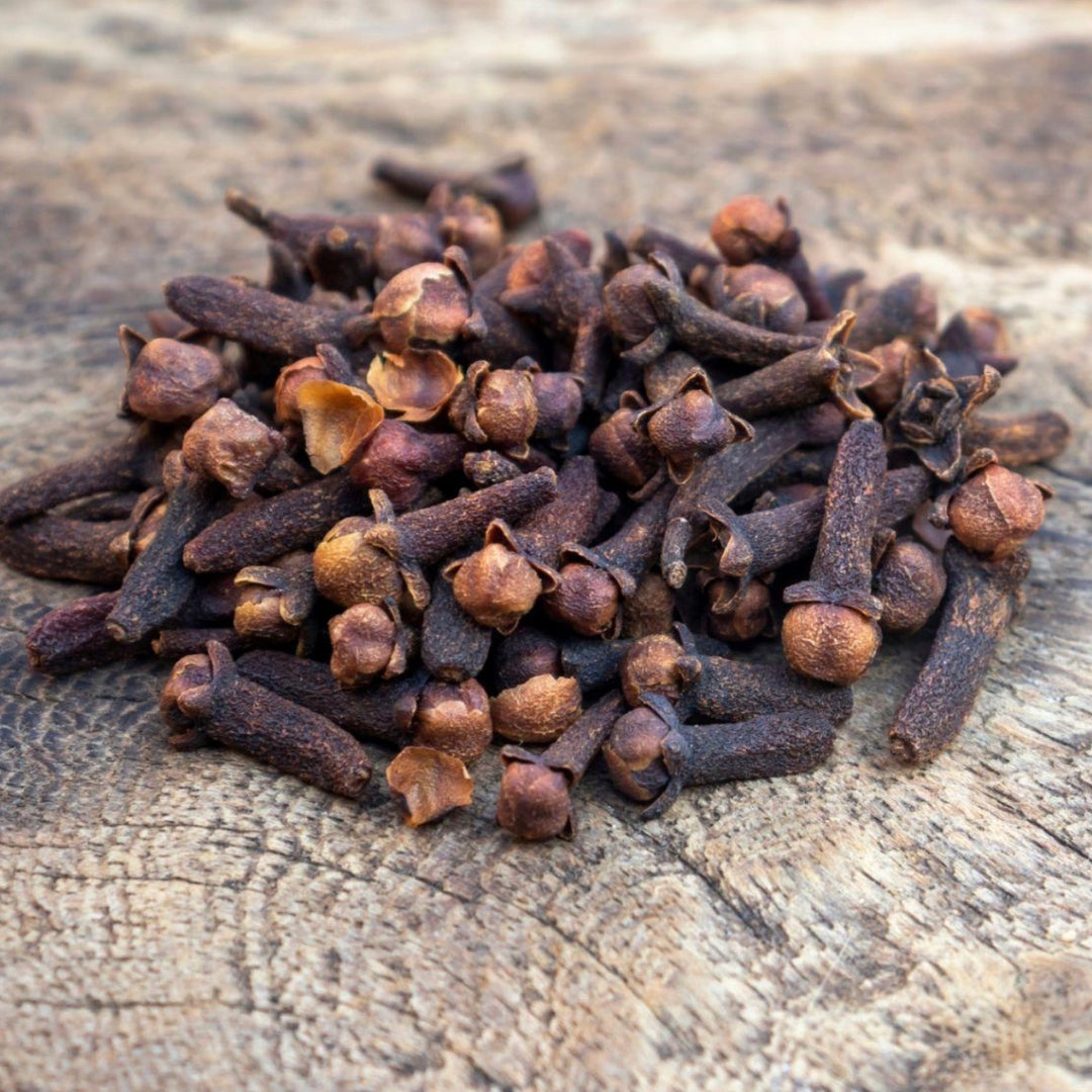 Cloves on a wooden surface
